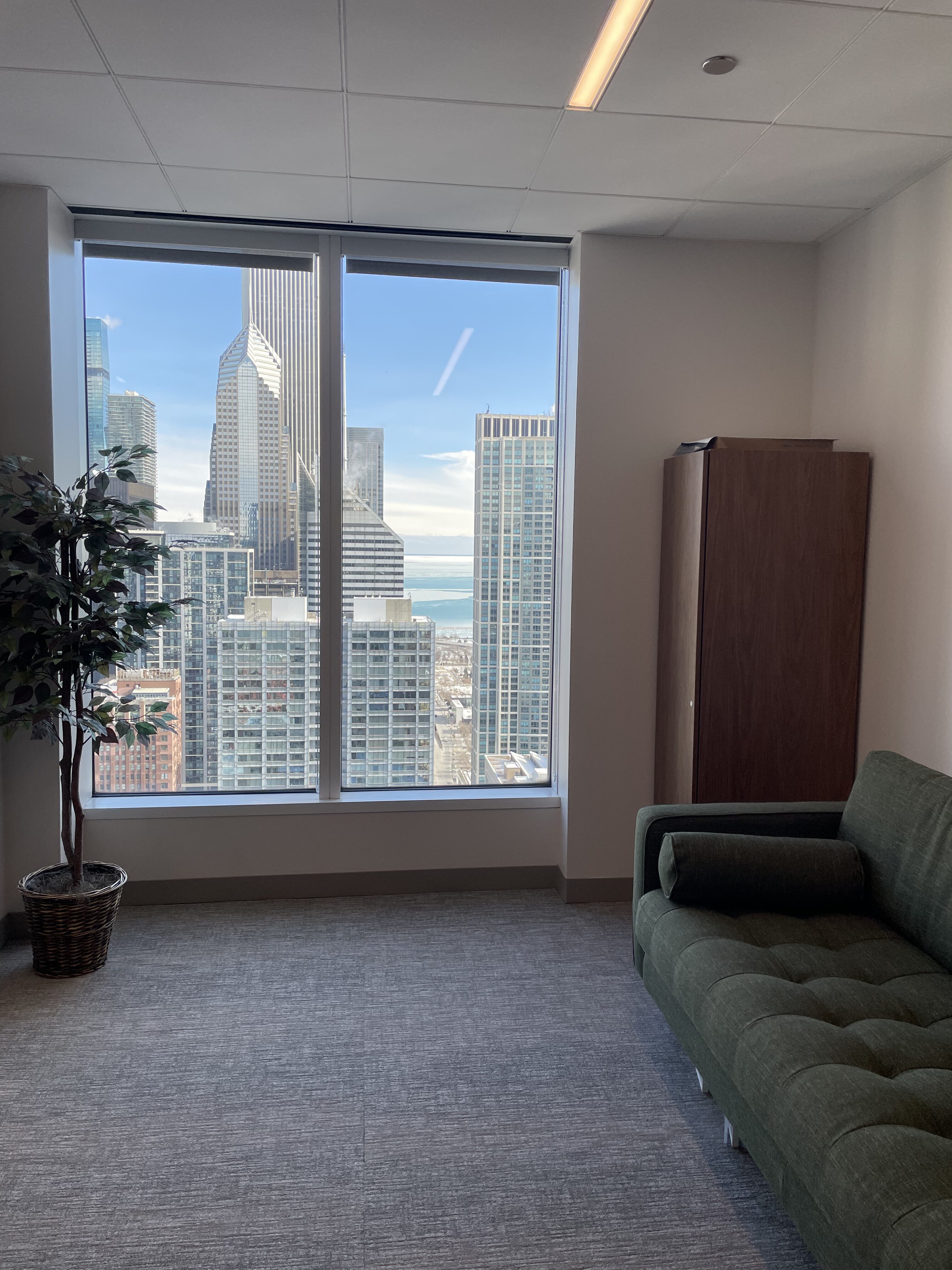 Marketing office - Director's Office Couch & View Vertical Light